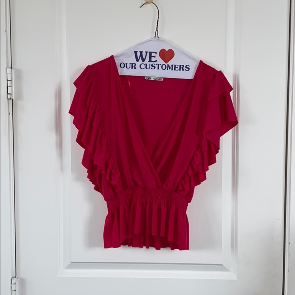 flowy pink blouse